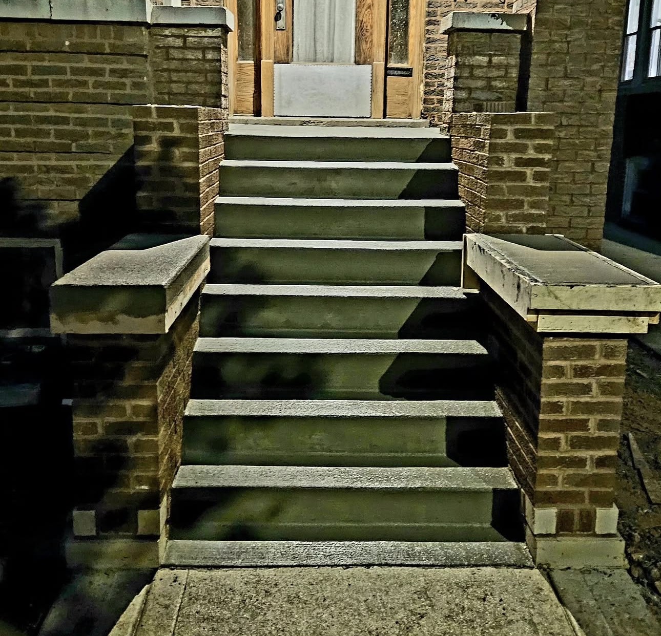 Grand masonry entryway staircase by GB Masonry
